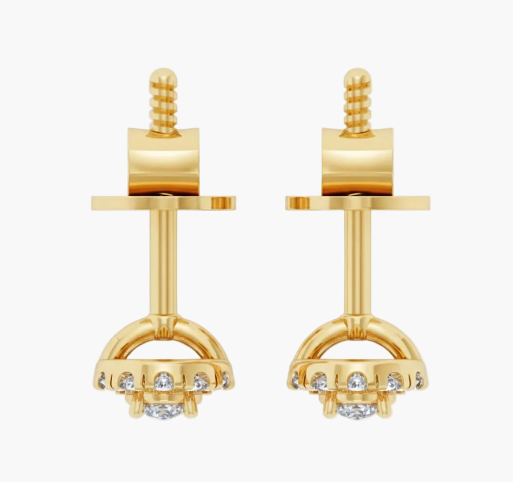 Gold earrings with diamond accents on a white background