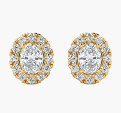 Gold and diamond earrings on a white background