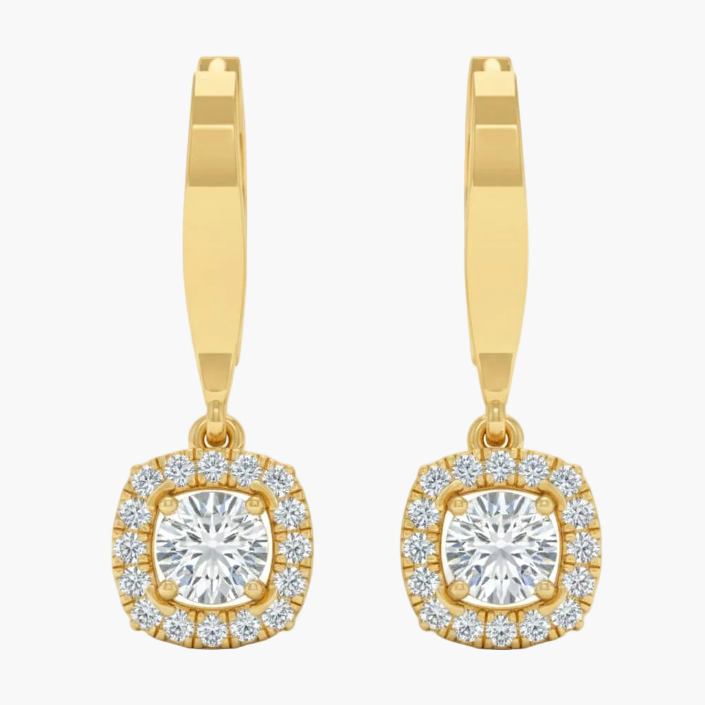 Gold hoop earrings with round gemstones on a white background