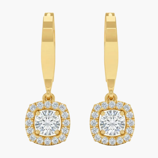 Gold hoop earrings with round gemstones on a white background