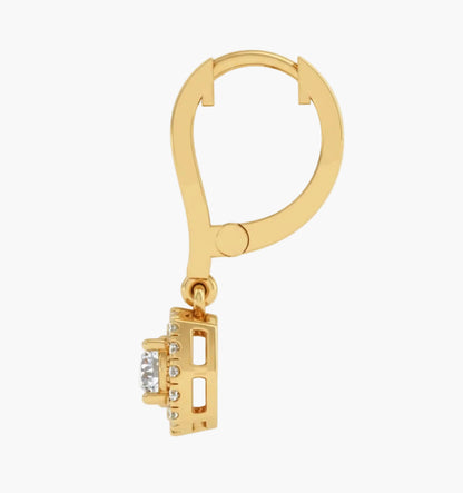 Gold hoop earring with a small pendant on a white background