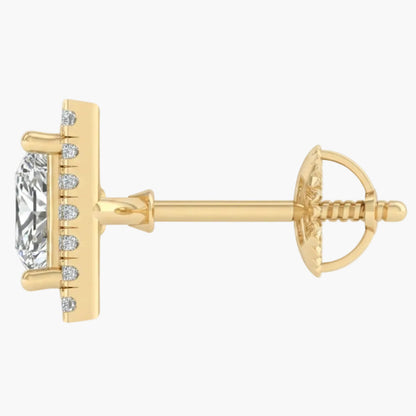 Gold earring with a clear gemstone on a white background