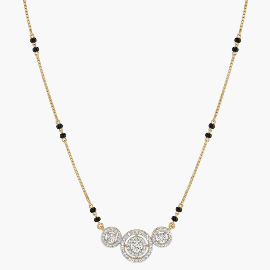 Necklace with gold chain, black beads, and diamond pendants on a white background