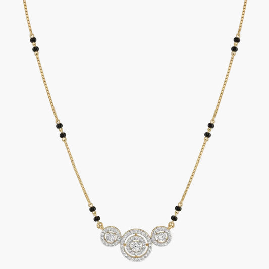 Necklace with gold chain, black beads, and diamond pendants on a white background
