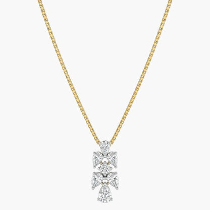 Gold necklace with a diamond pendant on a white background