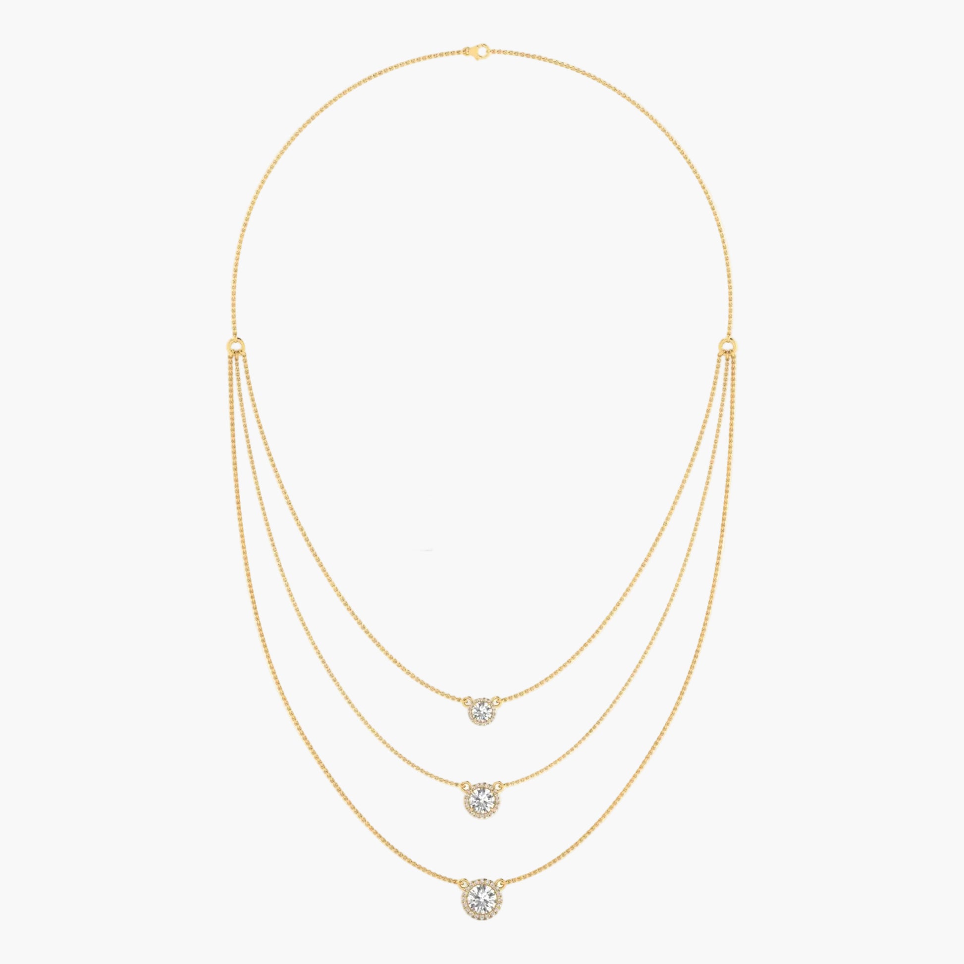 Gold necklace with three diamond pendants on a white background, branded 'Green Lab'.