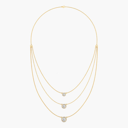 Gold necklace with three diamond pendants on a white background, branded 'Green Lab'.