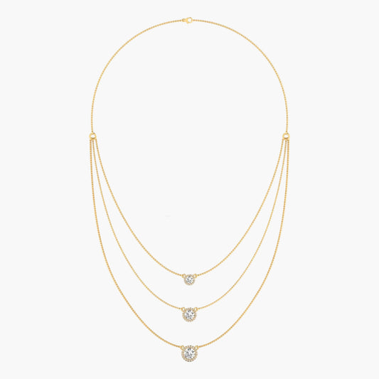 Gold necklace with three diamond pendants on a white background, branded 'Green Lab'.