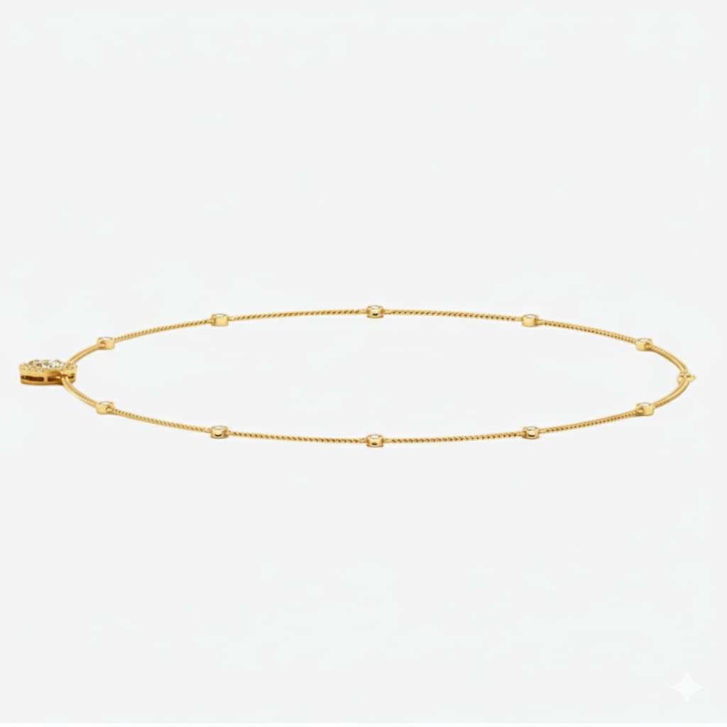 Gold necklace with a pear-shaped diamond pendant on a white background