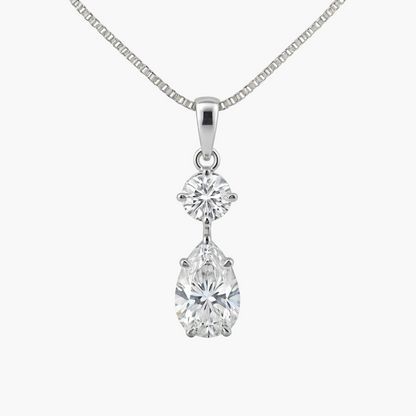 Diamond necklace with two clear gemstones on a white background