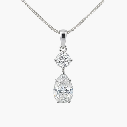 Diamond necklace with two clear gemstones on a white background
