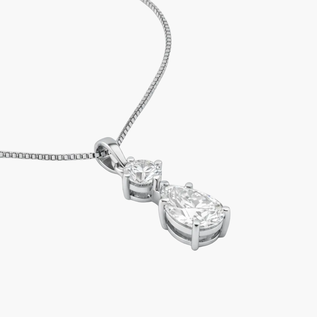 Diamond necklace with a teardrop pendant on a white background