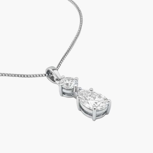 Diamond necklace with a teardrop pendant on a white background
