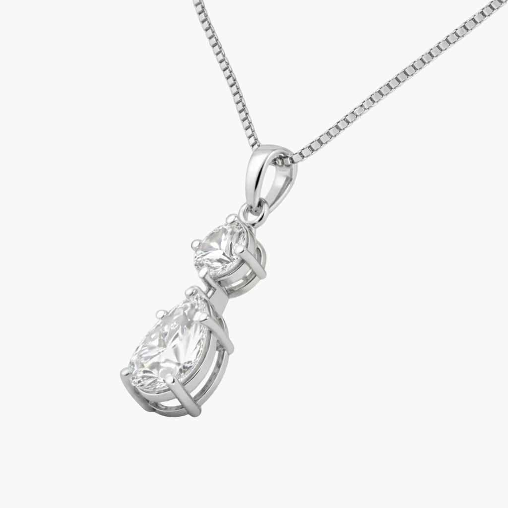 Diamond pendant necklace on a white background