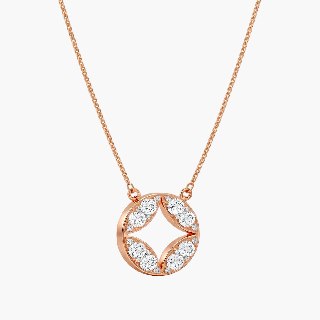 Rose gold necklace with a circular pendant on a white background
