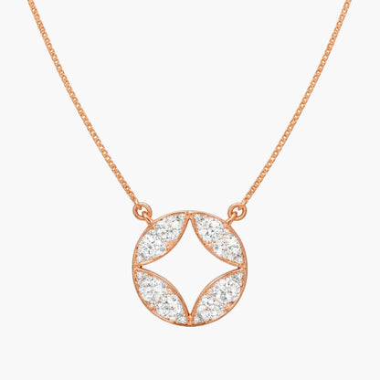 Rose gold necklace with a circular pendant on a white background
