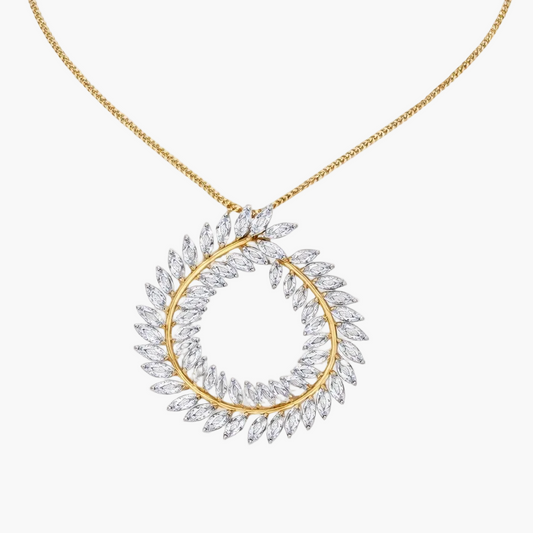 Gold necklace with a circular diamond pendant on a white background