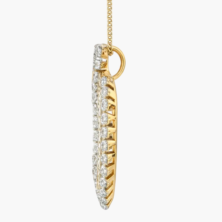 Gold necklace with a diamond pendant on a white background