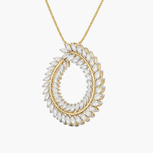 Gold necklace with a circular diamond pendant on a white background