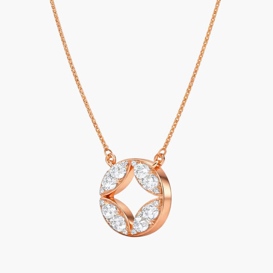 Rose gold necklace with a circular pendant featuring diamonds on a white background