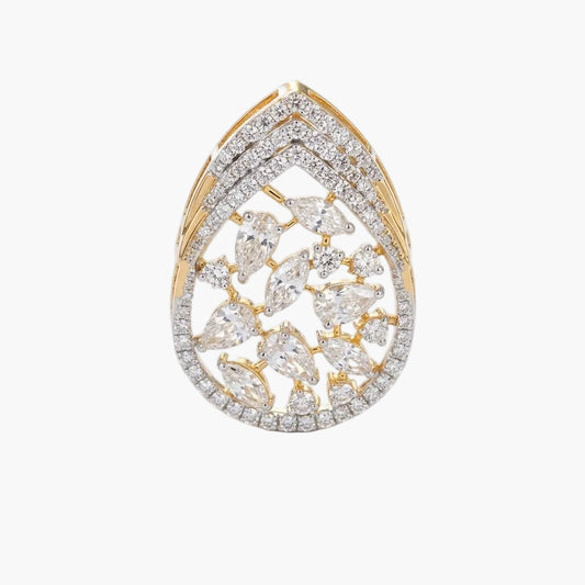 Gold and diamond teardrop-shaped ring on a white background