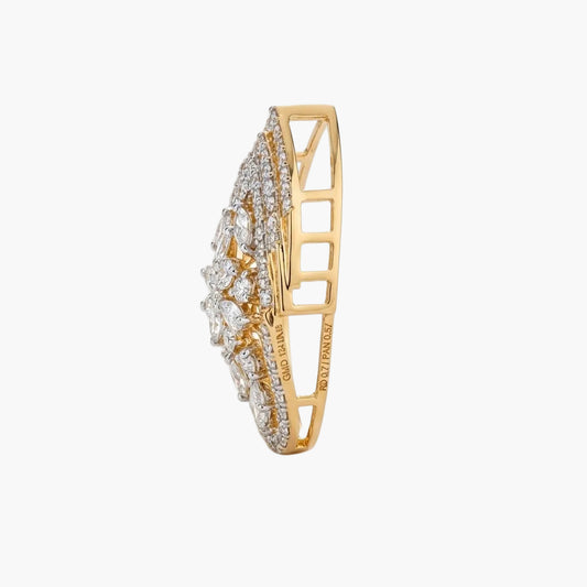 Gold ring with diamond accents on a white background