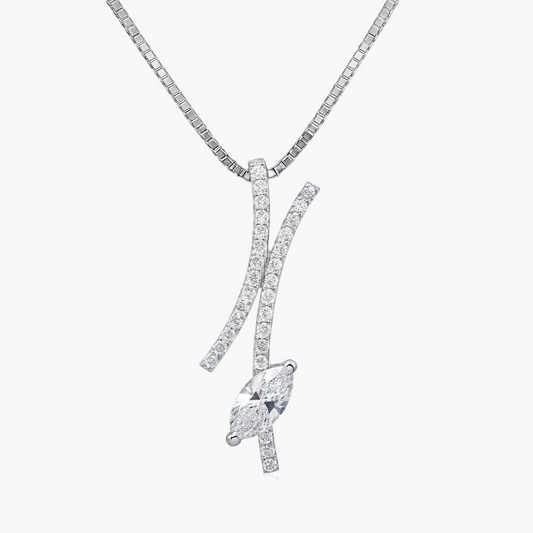 Diamond necklace with a leaf-shaped pendant on a white background