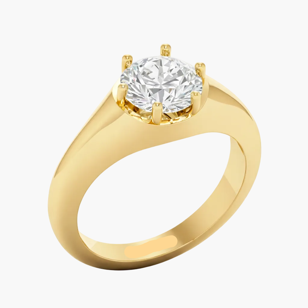 Gold ring with a diamond on a white background