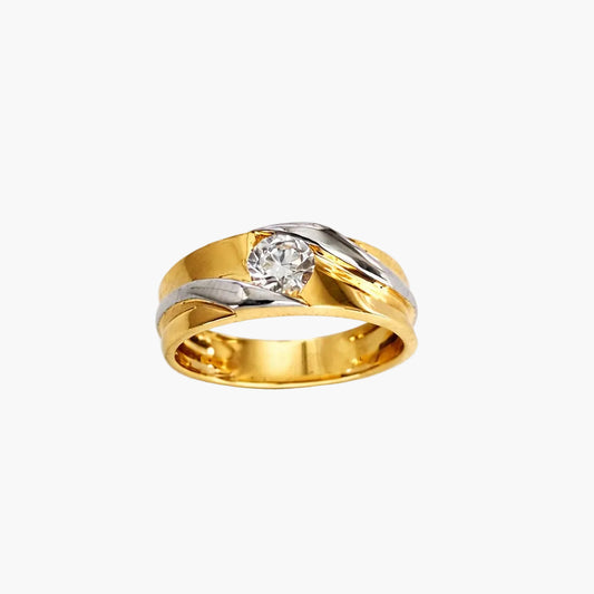 Gold ring with a diamond on a white background