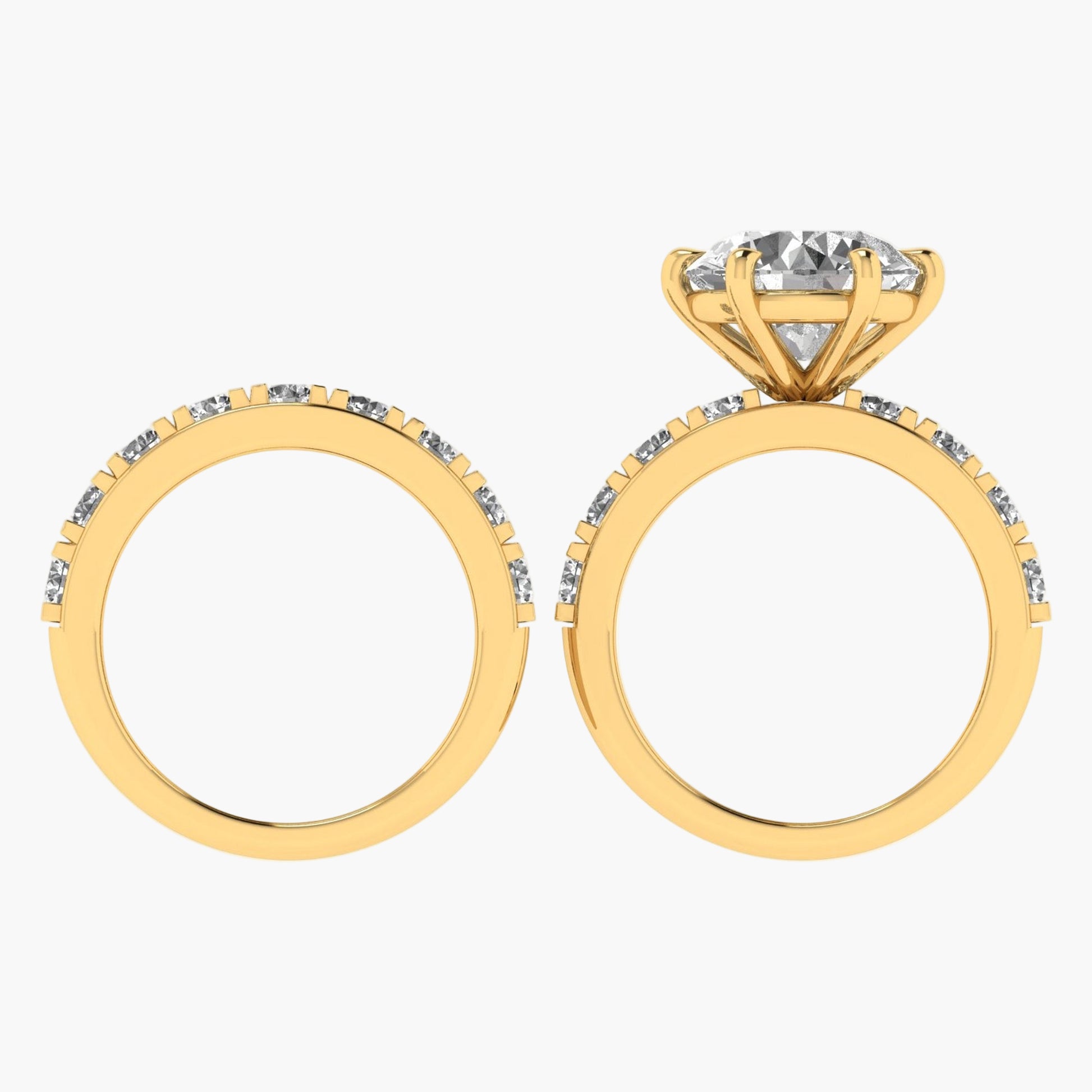 Gold hoop earrings with clear gemstones on a white background