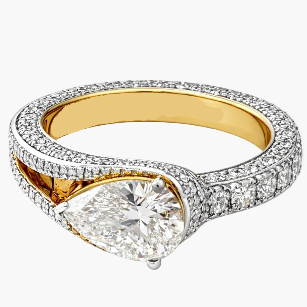 Gold and diamond ring on a white background