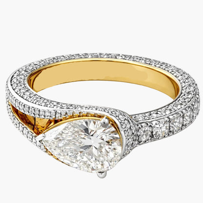 Gold and diamond ring on a white background