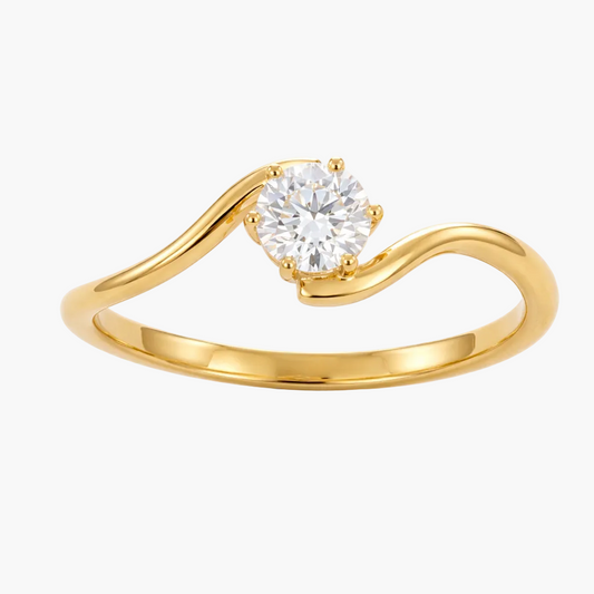 Gold ring with a diamond on a white background