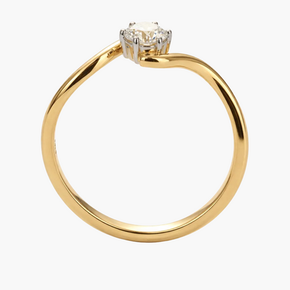 Gold ring with a diamond on a white background