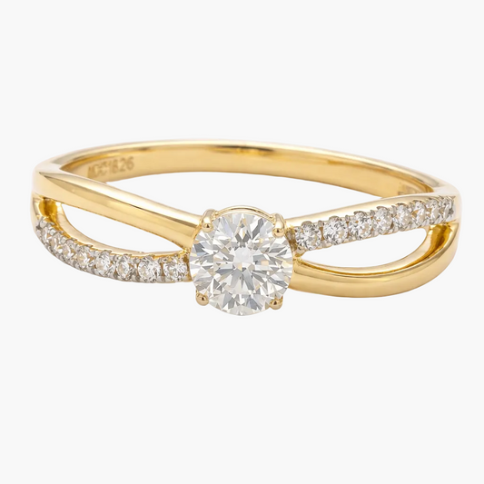 Gold ring with a diamond on a white background