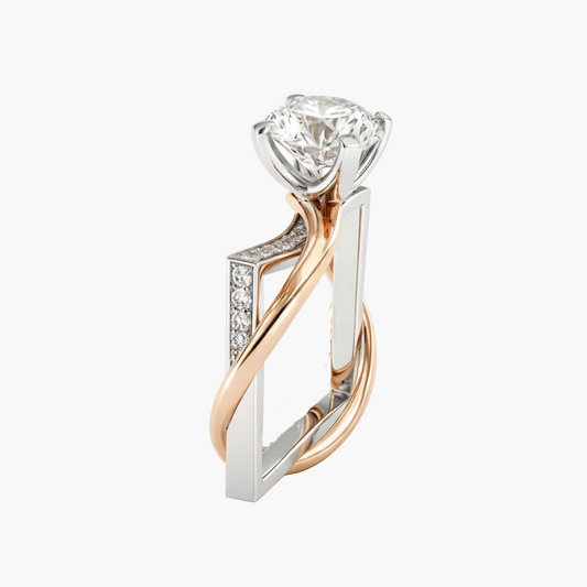 Two-tone diamond ring with a white and rose gold design on a white background