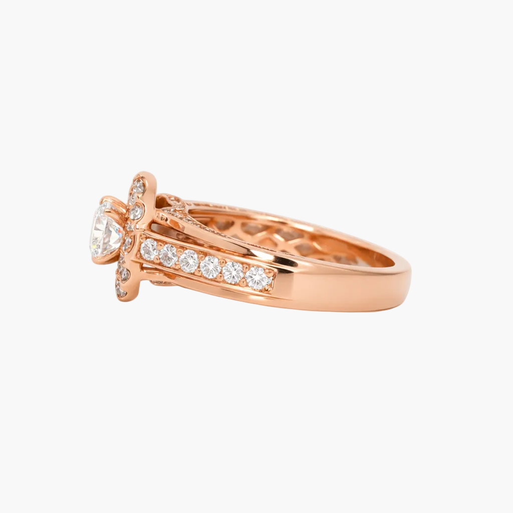 Rose gold ring with diamonds on a white background