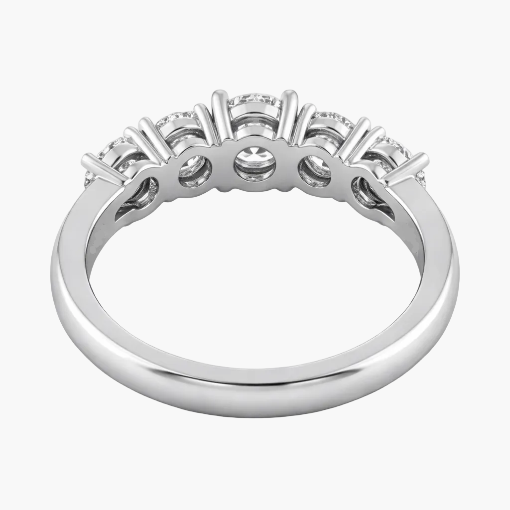 Silver ring with diamonds on a white background