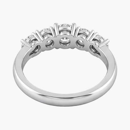 Silver ring with diamonds on a white background