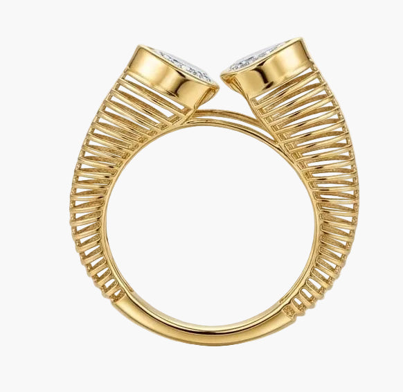 Set of gold rings with diamond accents on a light background