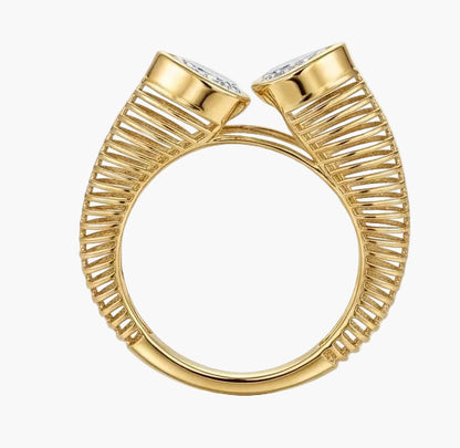 Set of gold rings with diamond accents on a light background