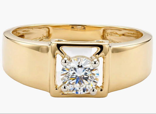 Gold ring with a diamond on a white background