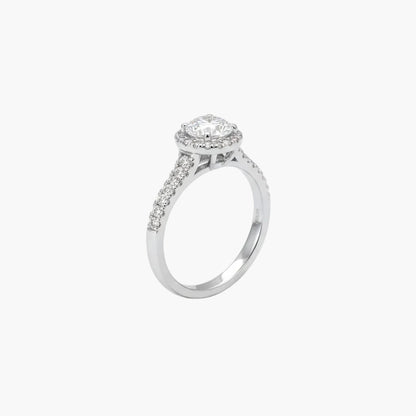 Silver ring with a diamond on a white background