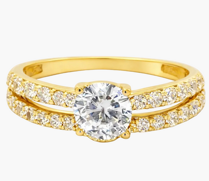 Gold ring with a diamond on a white background