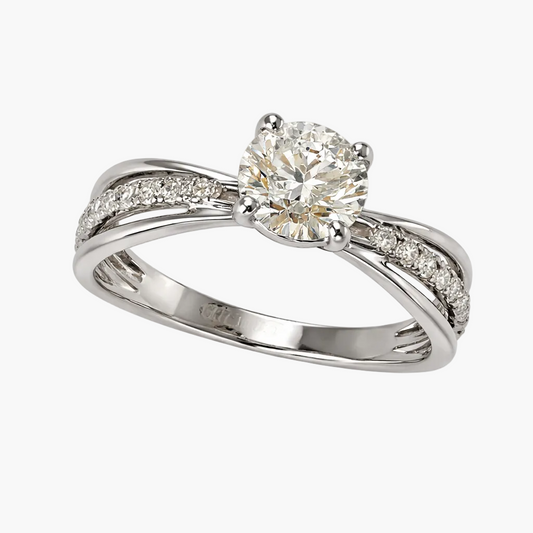 Diamond ring with a bow design on a white background