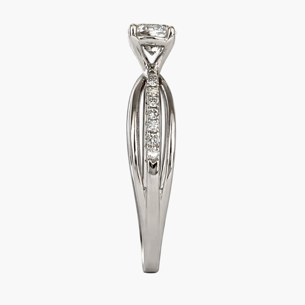 Silver ring with a diamond on a white background