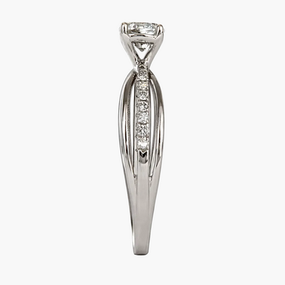 Silver ring with a diamond on a white background