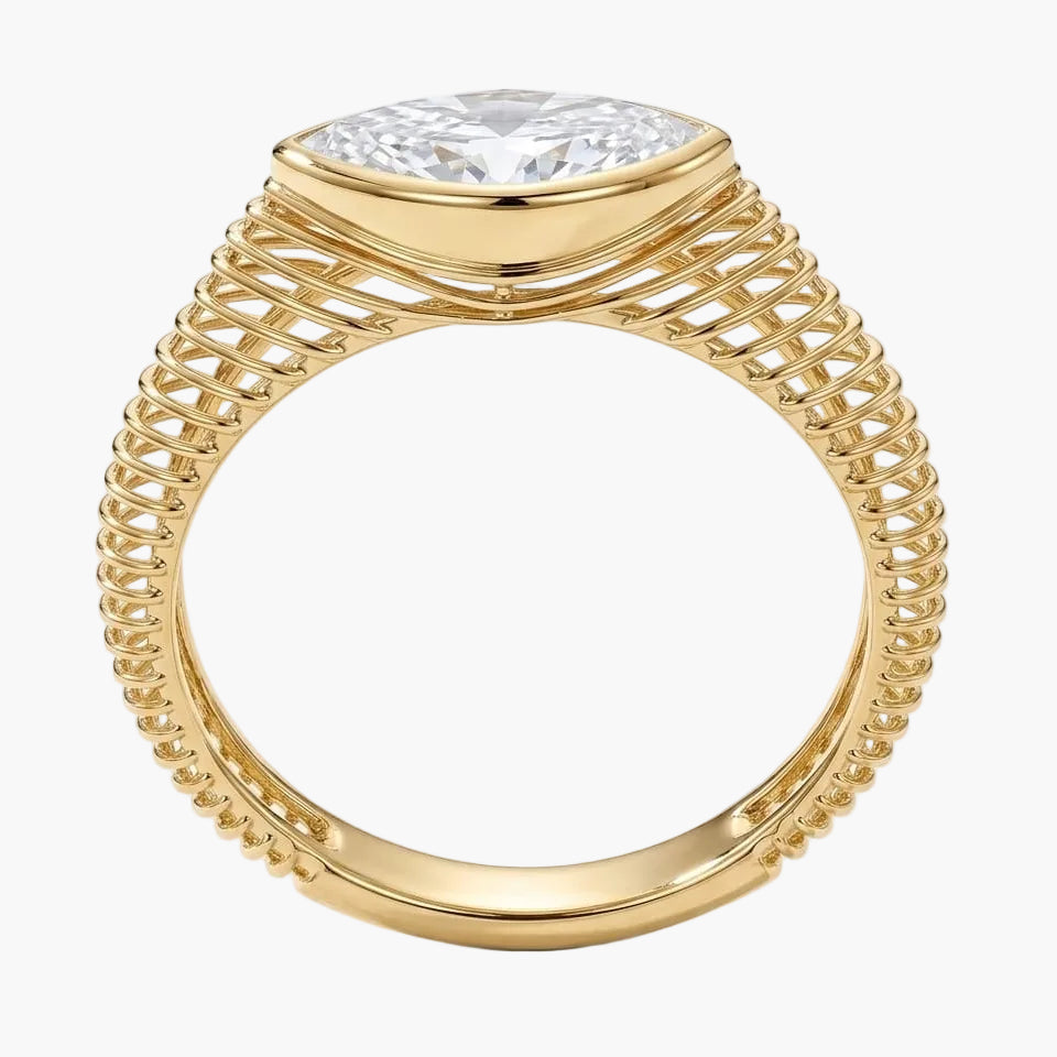 Gold ring with a diamond on a white background