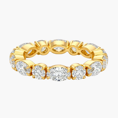 Gold ring with diamonds on a white background