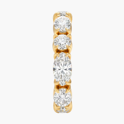 Gold and diamond ring on a white background